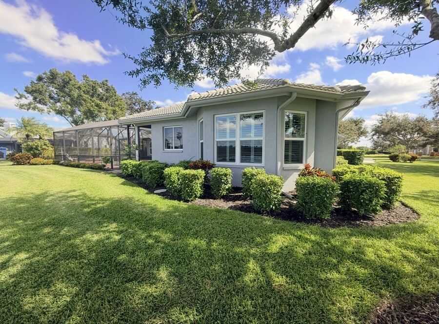 Repainted home exterior with fresh landscaping in Sarasota