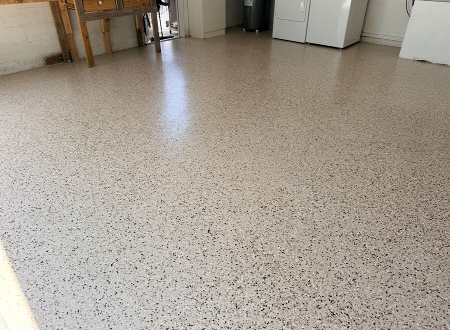 Epoxy flake floor coating in a garage laundry area